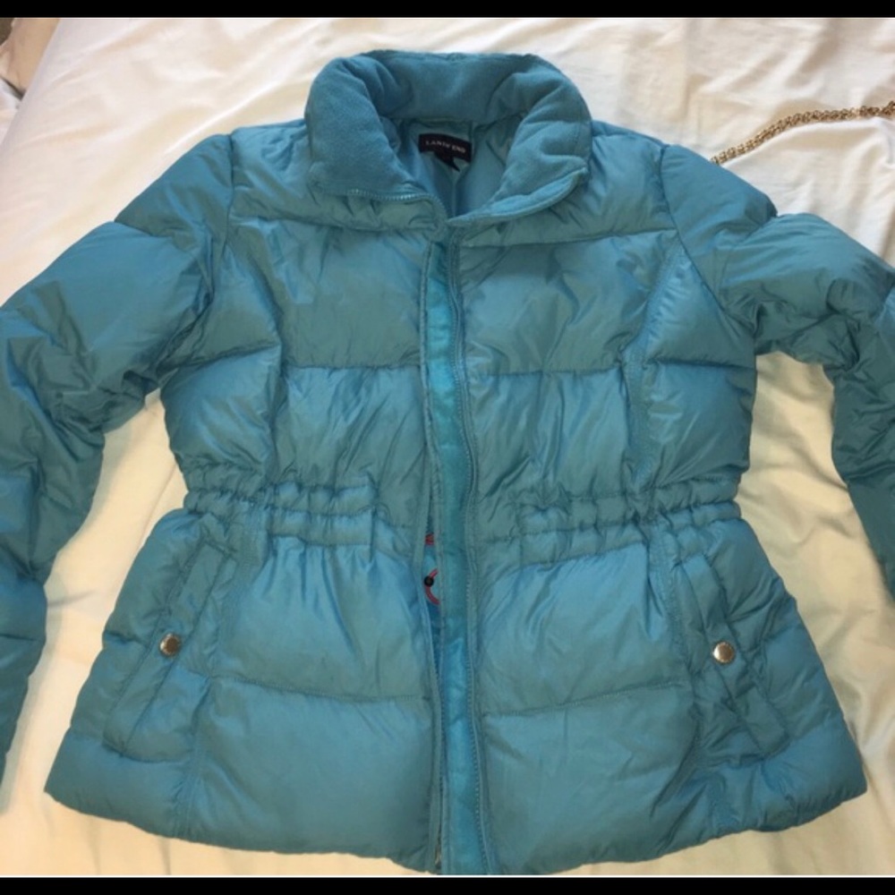 Land's end ski jacket in blue. Waist cinch feature
